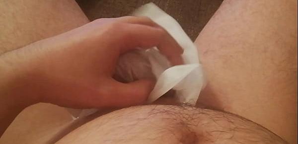  Close-up tease with paper covering dick